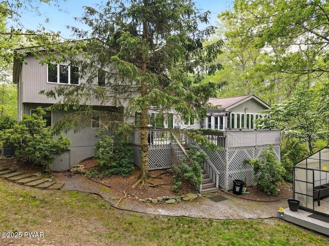 202 Remuda Dr, Lords Valley, PA 18428 - rear view of property featuring a wooden deck and stairs