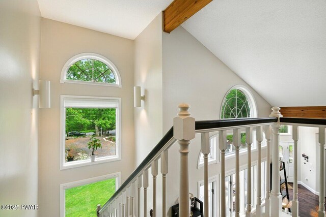202 Remuda Dr, Lords Valley, PA 18428 - stairs featuring high vaulted ceiling, beam ceiling, and wood finished floors