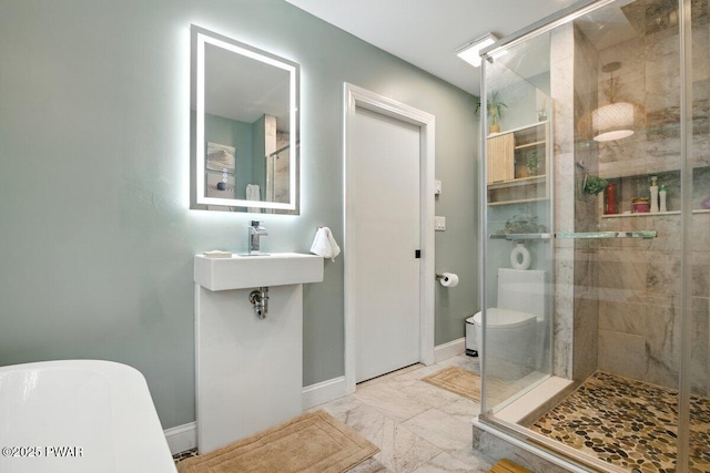 202 Remuda Dr, Lords Valley, PA 18428 - bathroom with a stall shower, marble finish flooring, and a freestanding bath