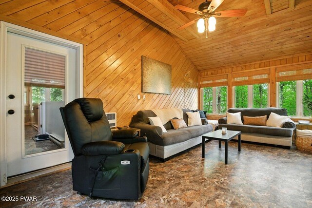 202 Remuda Dr, Lords Valley, PA 18428 - living area with wood ceiling, vaulted ceiling, wood walls, and a ceiling fan