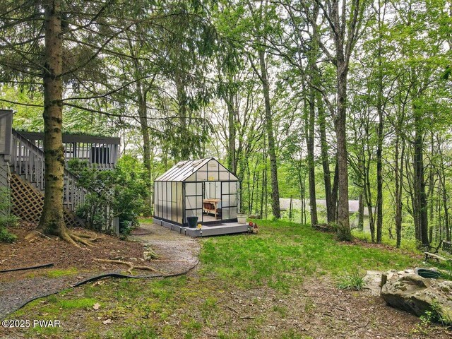 202 Remuda Dr, Lords Valley, PA 18428 - view of yard featuring an outbuilding, a deck, a greenhouse, and stairs