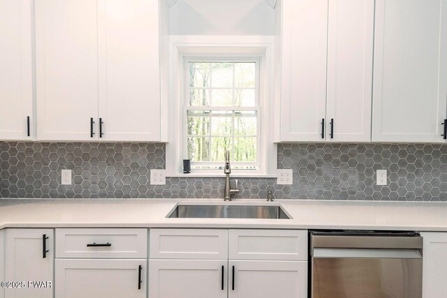 209 Conashaugh Trl, Milford, PA 18337 - kitchen with stainless steel dishwasher, light countertops, backsplash, and white cabinets