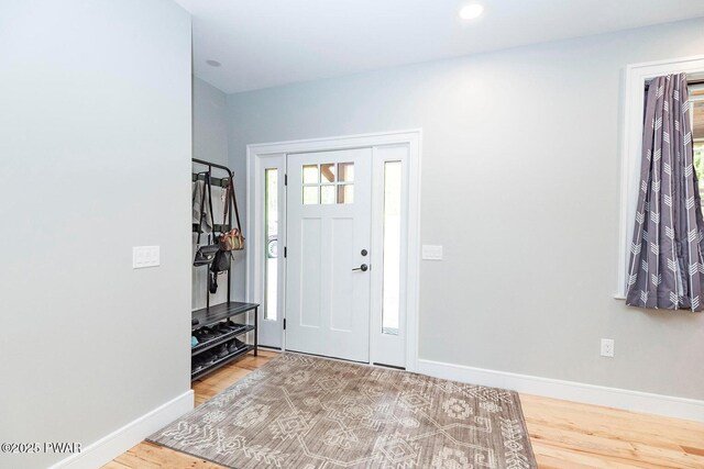 209 Conashaugh Trl, Milford, PA 18337 - entrance foyer featuring wood finished floors and recessed lighting