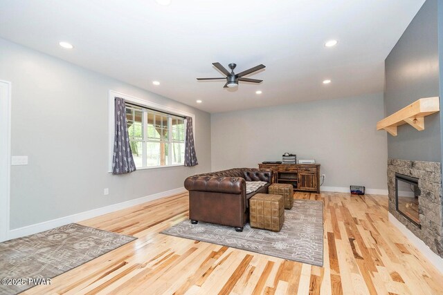 209 Conashaugh Trl, Milford, PA 18337 - living area featuring wood finished floors, a ceiling fan, a fireplace, and recessed lighting