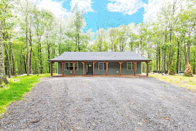 209 Conashaugh Trl, Milford, PA 18337 - view of front of home featuring covered porch and driveway