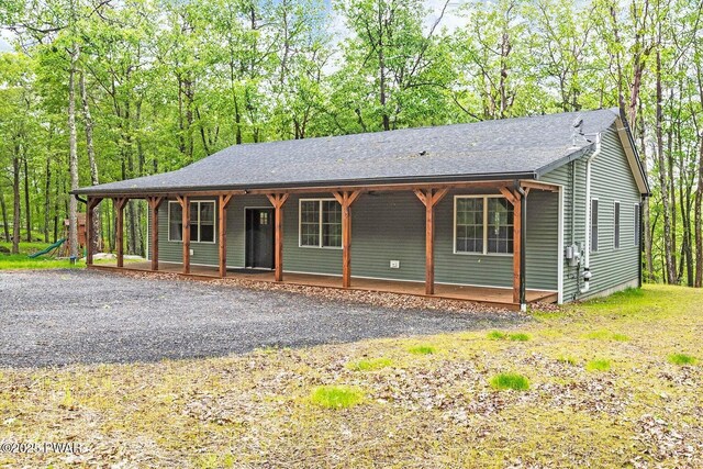 209 Conashaugh Trl, Milford, PA 18337 - view of front of property with covered porch and a shingled roof