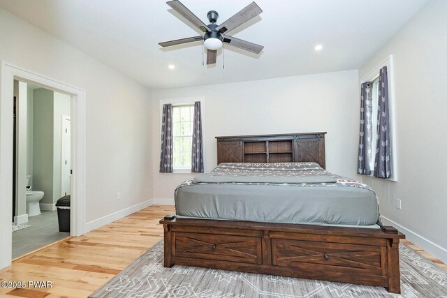 209 Conashaugh Trl, Milford, PA 18337 - bedroom featuring wood finished floors, connected bathroom, recessed lighting, and a ceiling fan