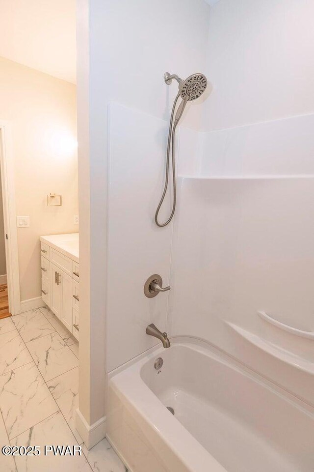 209 Conashaugh Trl, Milford, PA 18337 - bathroom featuring marble look tiles, tub / shower combination, and vanity