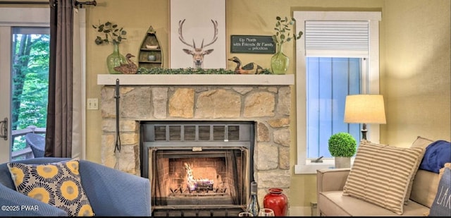 sitting room with a fireplace