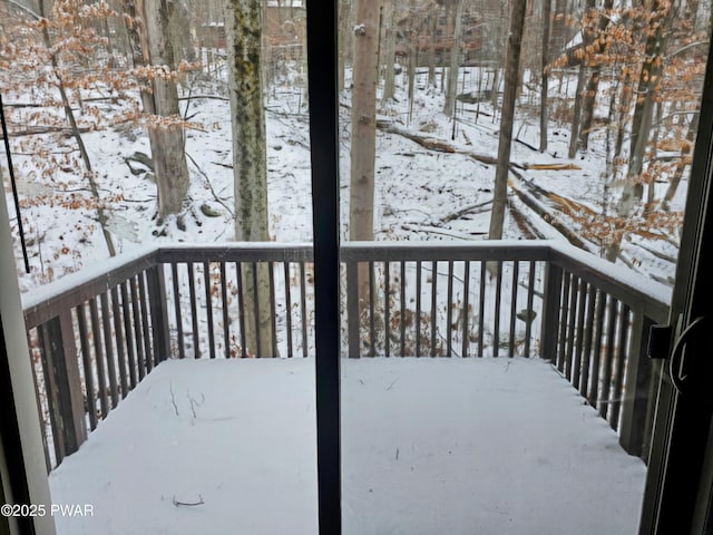 view of snow covered deck