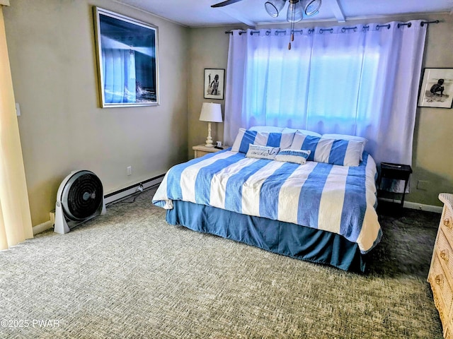 bedroom with carpet flooring, ceiling fan, and a baseboard heating unit