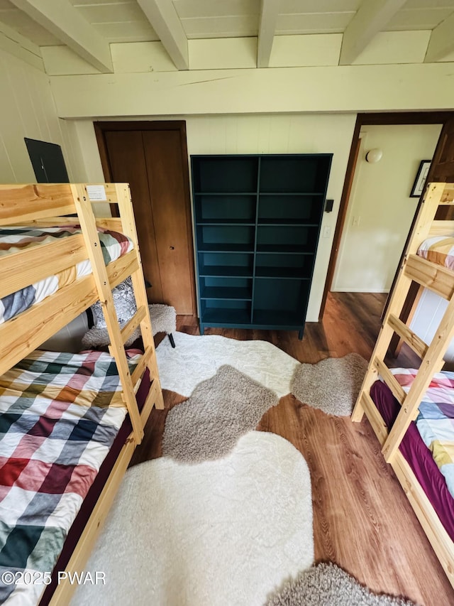 124 Granite Dr, Lords Valley, PA 18428 - bedroom featuring wood finished floors, beamed ceiling, and a closet