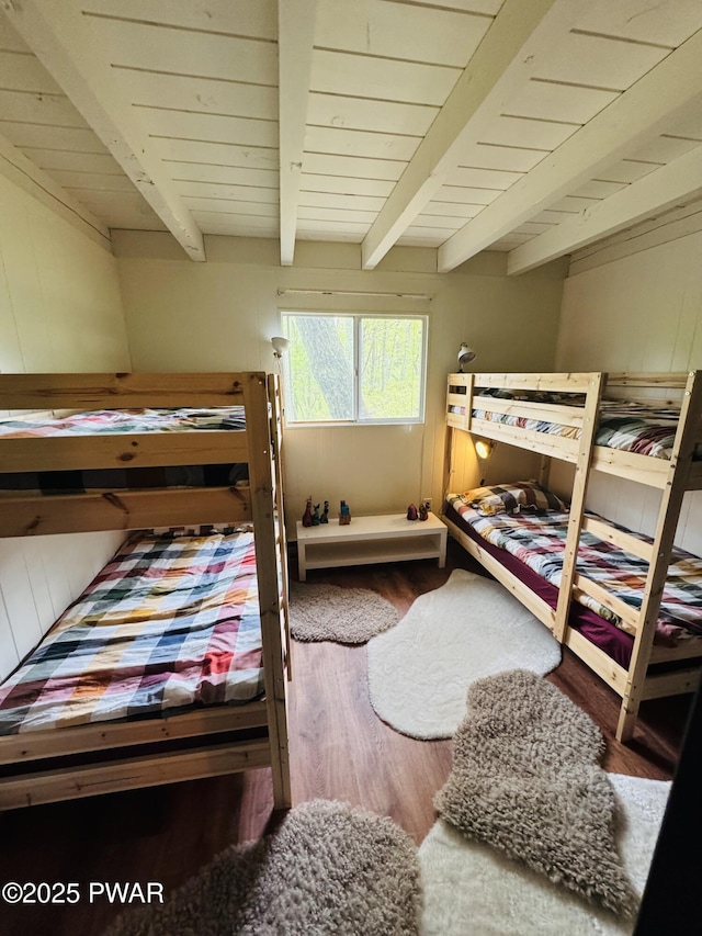 124 Granite Dr, Lords Valley, PA 18428 - bedroom featuring beamed ceiling, wood finished floors, and wooden ceiling
