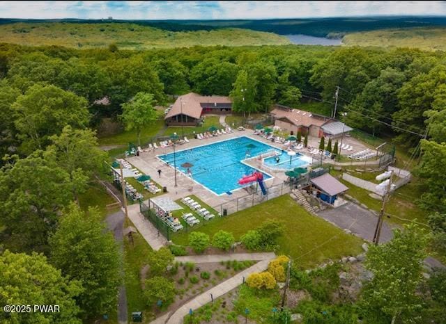 124 Granite Dr, Lords Valley, PA 18428 - view of property location featuring a forest and a pool area