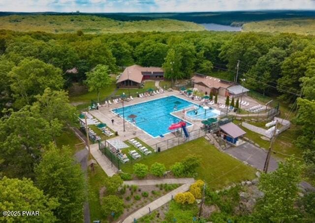 124 Granite Dr, Lords Valley, PA 18428 - aerial view of a heavily wooded area and a pool area