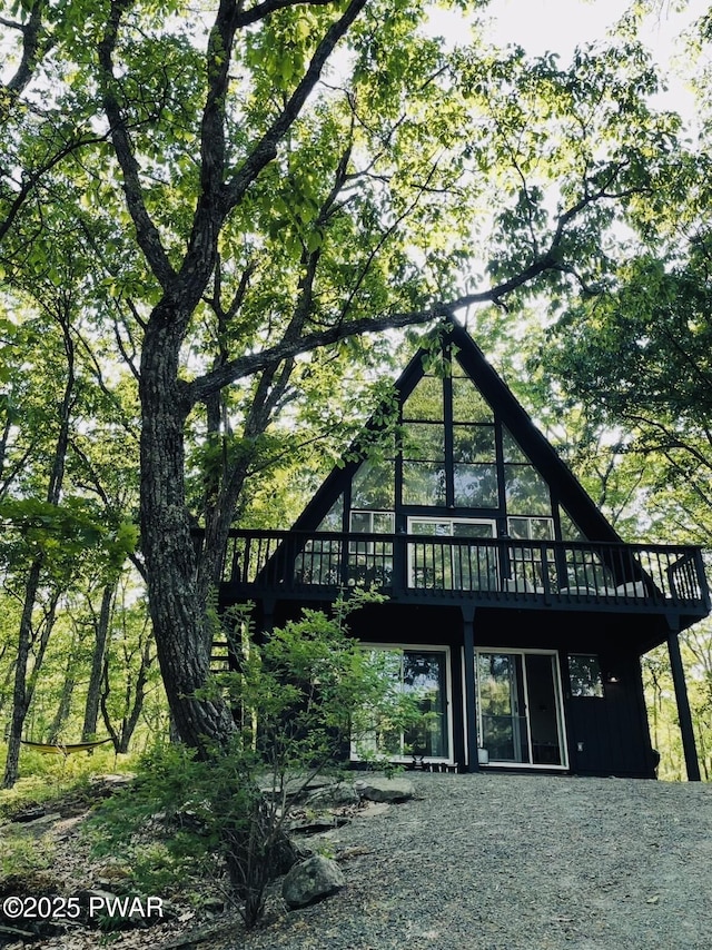 124 Granite Dr, Lords Valley, PA 18428 - back of house featuring a wooden deck