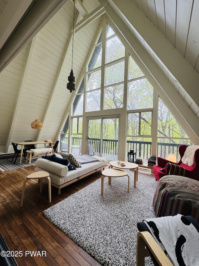 124 Granite Dr, Lords Valley, PA 18428 - living area featuring hardwood / wood-style flooring, high vaulted ceiling, beamed ceiling, plenty of natural light, and wooden ceiling