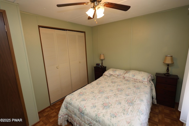 bedroom with a closet and a ceiling fan