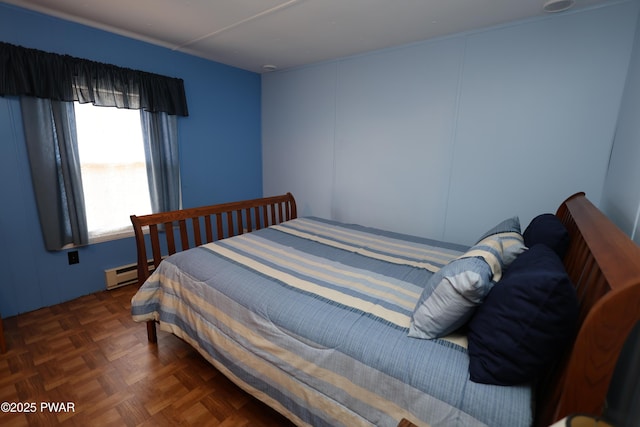 bedroom featuring a baseboard radiator