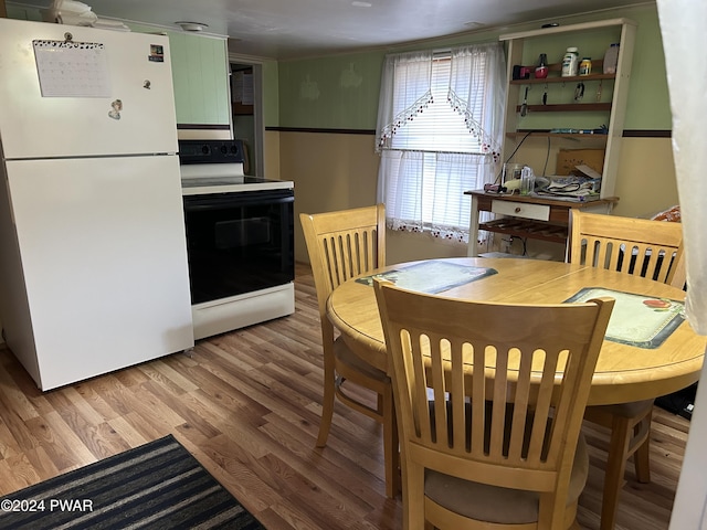 dining room featuring hardwood / wood-style flooring