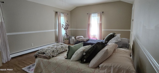 300 W High St, Milford, PA 18337 - bedroom with wood finished floors, vaulted ceiling, and a baseboard heating unit