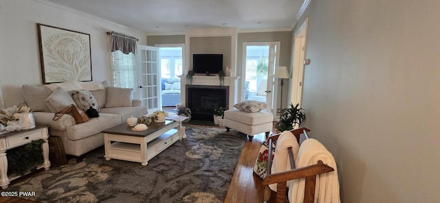 300 W High St, Milford, PA 18337 - living area with a fireplace with flush hearth, crown molding, and dark wood finished floors