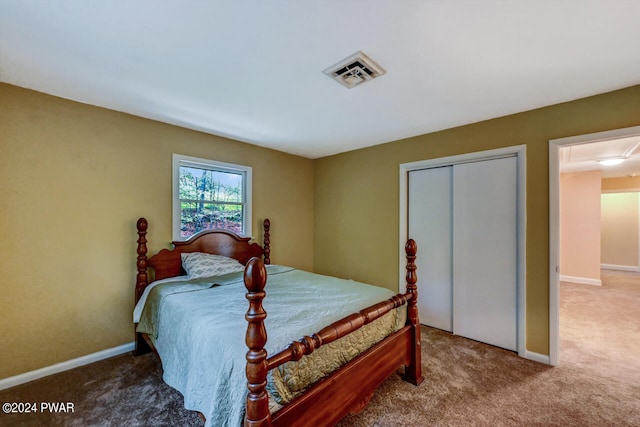 carpeted bedroom with a closet