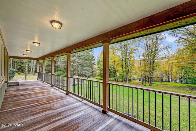 deck featuring a lawn