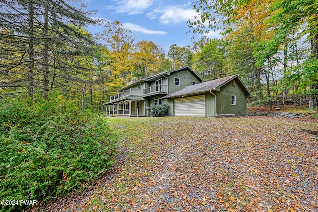 view of front of property with a balcony