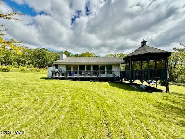 114 Orchard Dr, Lords Valley, PA 18428 - rear view of property featuring a gazebo, a lawn, and a deck