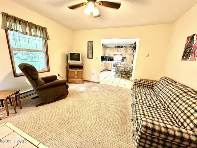 121 Canterbrook Dr, Hawley, PA 18428 - living room featuring ceiling fan and light tile patterned flooring