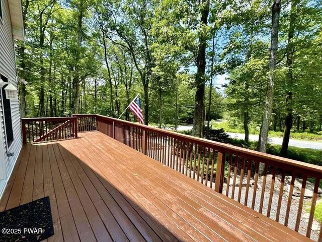 121 Canterbrook Dr, Hawley, PA 18428 - wooden deck with view of scattered trees