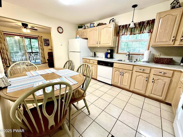 121 Canterbrook Dr, Hawley, PA 18428 - kitchen featuring white appliances, light brown cabinets, light countertops, and plenty of natural light