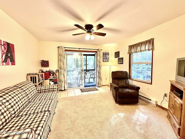 121 Canterbrook Dr, Hawley, PA 18428 - carpeted living room with a baseboard radiator and ceiling fan