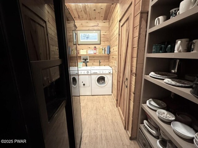 498 Penn York Rd, Starlight, PA 18461 - washroom with independent washer and dryer, wooden walls, wooden ceiling, and light wood-type flooring