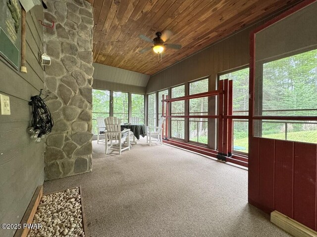 498 Penn York Rd, Starlight, PA 18461 - sunroom / solarium with a ceiling fan, carpet flooring, vaulted ceiling, wooden ceiling, and wooden walls