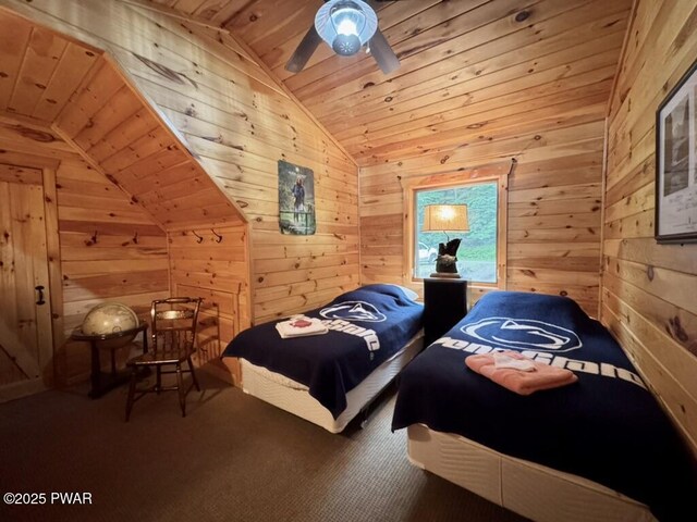 498 Penn York Rd, Starlight, PA 18461 - bedroom with vaulted ceiling, wooden ceiling, wood walls, carpet flooring, and ceiling fan
