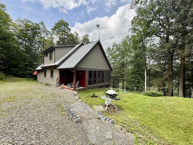 498 Penn York Rd, Starlight, PA 18461 - chalet / cabin featuring a front lawn