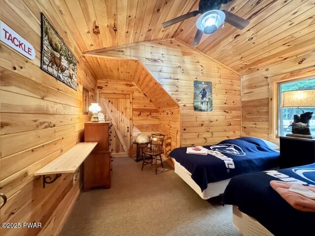 498 Penn York Rd, Starlight, PA 18461 - carpeted bedroom featuring wood walls, wood ceiling, lofted ceiling, and ceiling fan