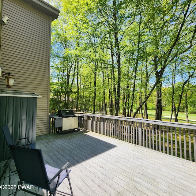344 Canoebrook Dr, Lords Valley, PA 18428 - wooden terrace featuring view of scattered trees and area for grilling