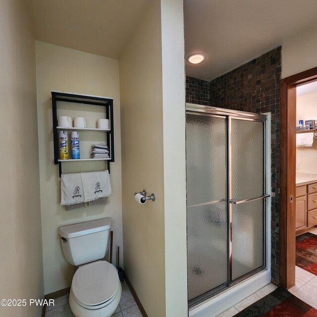 344 Canoebrook Dr, Lords Valley, PA 18428 - full bath with a shower stall, tile patterned flooring, and toilet