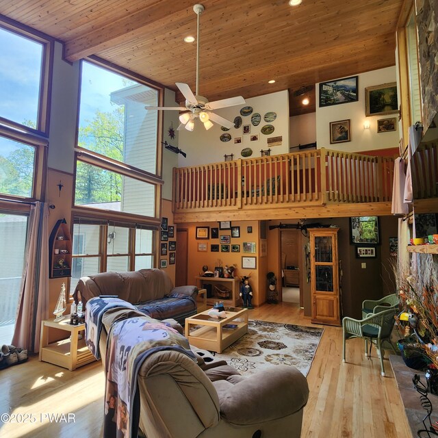 344 Canoebrook Dr, Lords Valley, PA 18428 - living area featuring a towering ceiling, hardwood / wood-style flooring, wooden ceiling, ceiling fan, and plenty of natural light