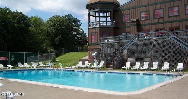 344 Canoebrook Dr, Lords Valley, PA 18428 - community pool with stairway and a patio