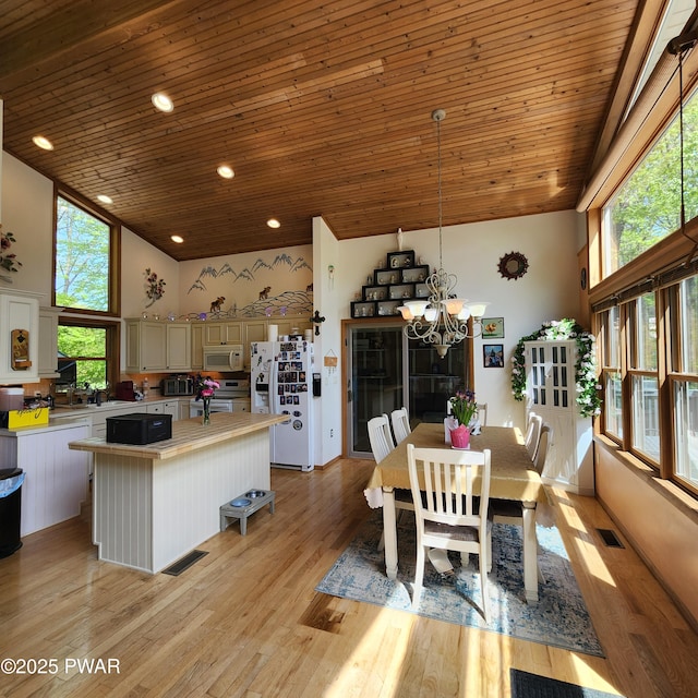 344 Canoebrook Dr, Lords Valley, PA 18428 - dining room with wood ceiling, a chandelier, healthy amount of natural light, high vaulted ceiling, and light wood-style flooring