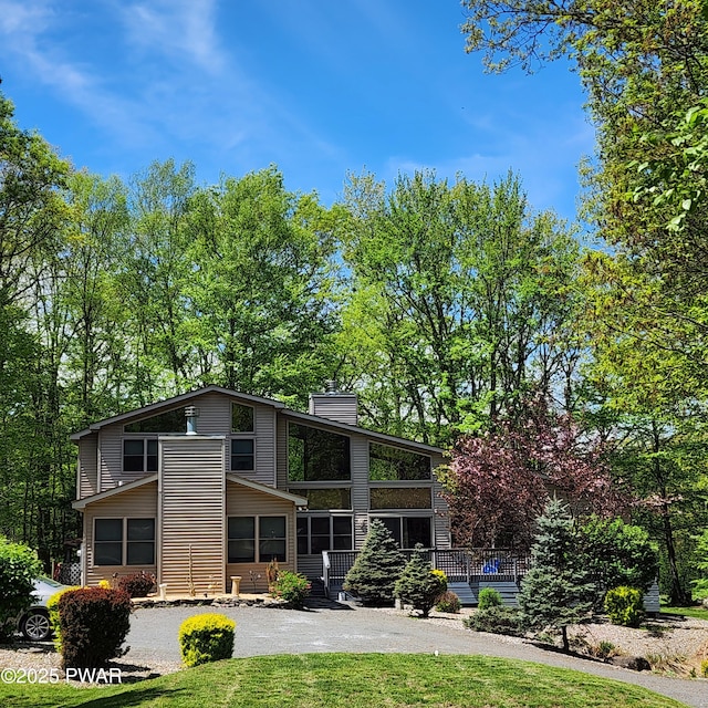 344 Canoebrook Dr, Lords Valley, PA 18428 - view of front of home with a chimney and driveway