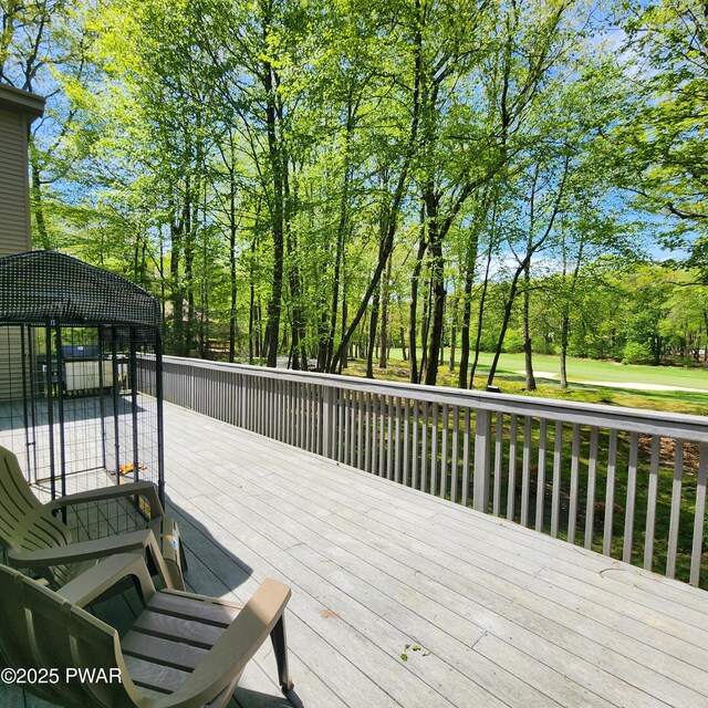 344 Canoebrook Dr, Lords Valley, PA 18428 - wooden terrace featuring view of scattered trees