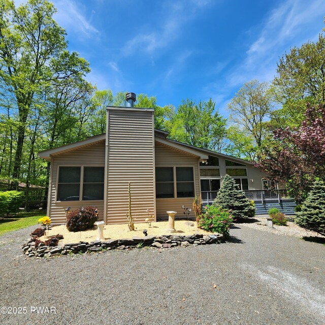 344 Canoebrook Dr, Lords Valley, PA 18428 - rear view of property featuring a chimney