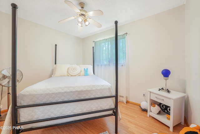 103 Westfall Dr, Dingmans Ferry, PA 18328 - bedroom with light wood-type flooring and a ceiling fan