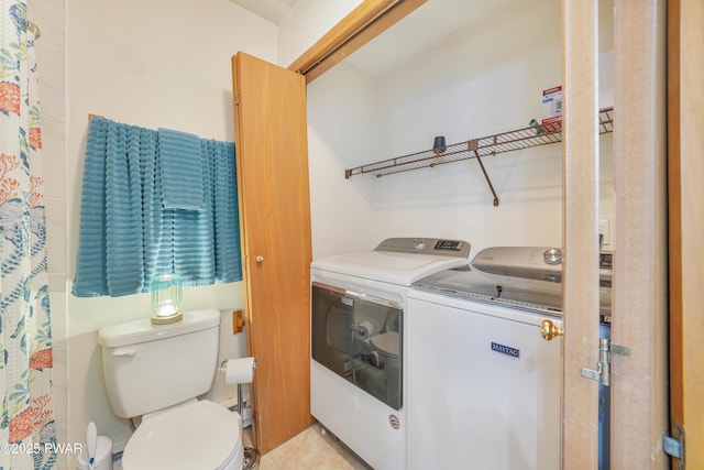 103 Westfall Dr, Dingmans Ferry, PA 18328 - washroom with independent washer and dryer and light tile patterned floors