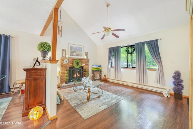 103 Westfall Dr, Dingmans Ferry, PA 18328 - living area featuring a baseboard radiator, ceiling fan, wood finished floors, high vaulted ceiling, and a fireplace